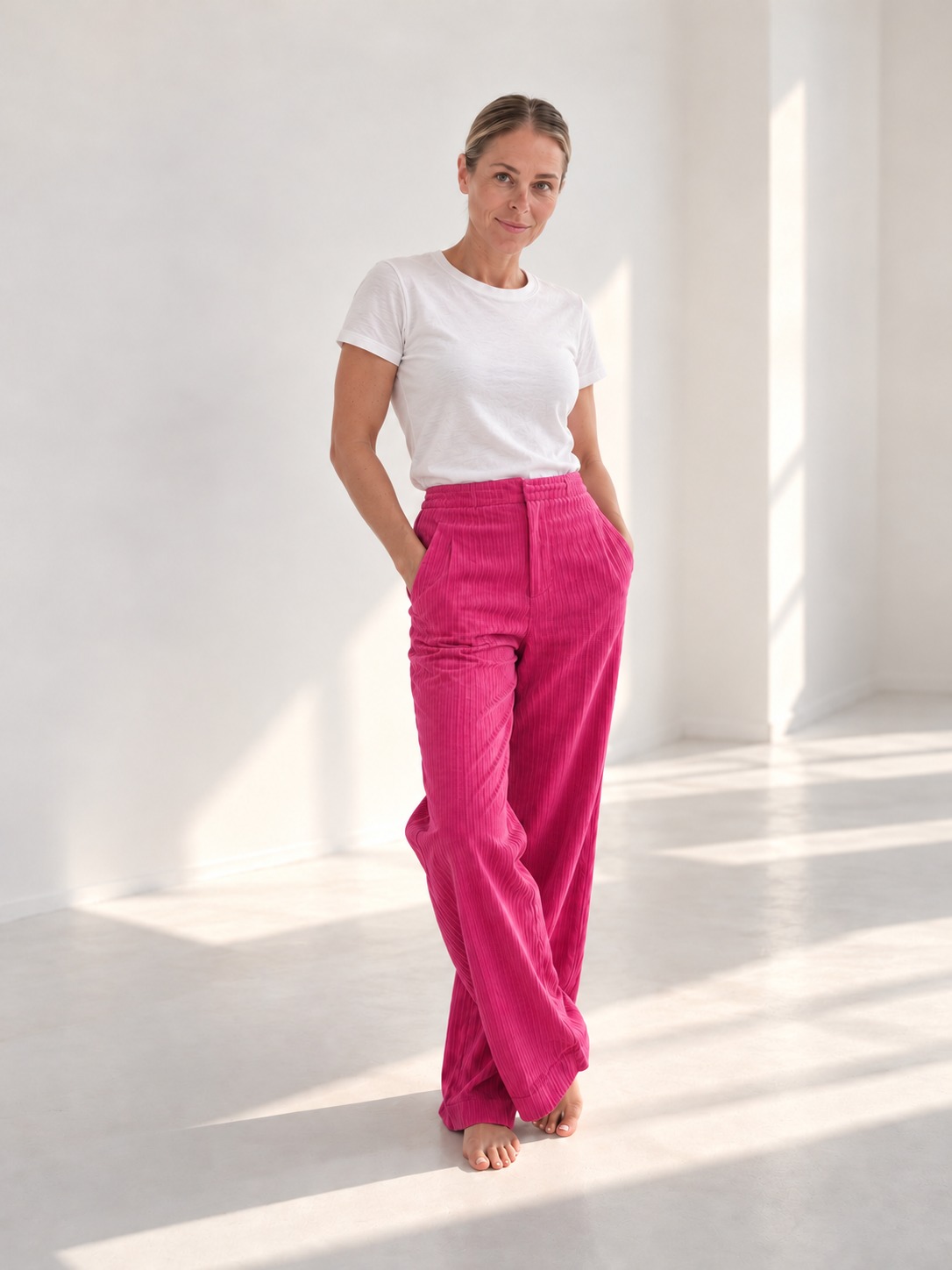 Christina Michael in pink trousers